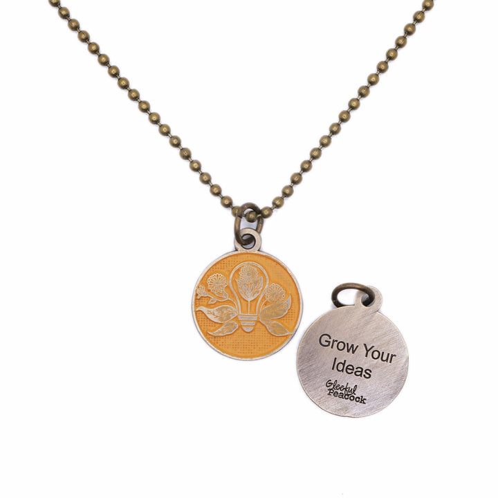 Grow Your Ideas Token (available with Bracelet or Necklace)