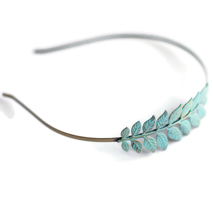 Antique bronze heaband adorned with greek-inspired laurel charm. Hand-painted mint green. Bohemian headband.