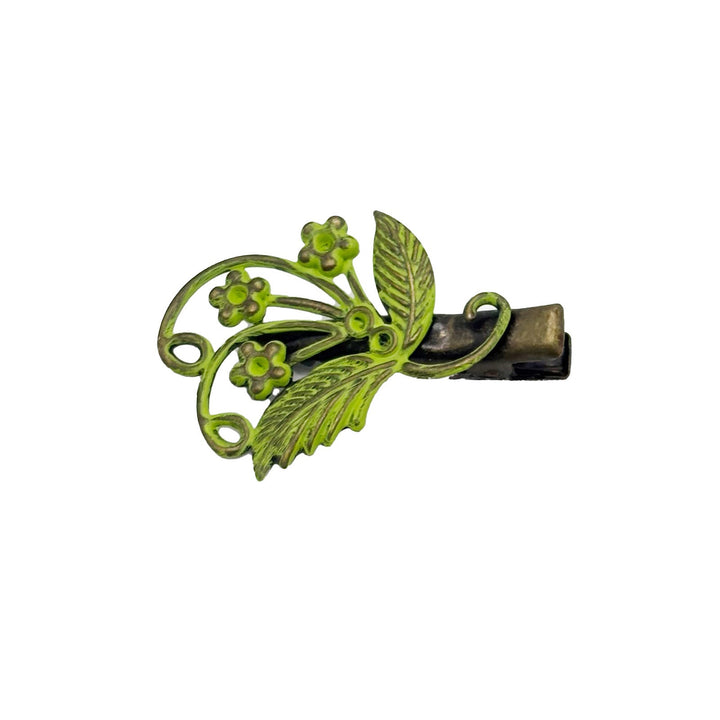 Tendrils Hair Clip with blooming flowers, swirling tendrils, and leaves. Hand-painted, hypoallergenic, lead-free, nickel-free. 1 1/2” filigree charm on 1 1/4” clip.