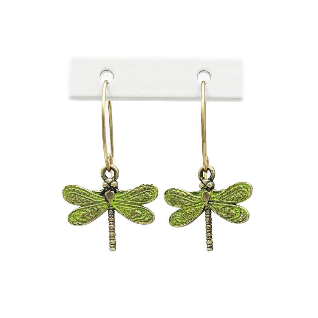 Hand-painted dragonfly charm earrings symbolizing transformation and personal growth, crafted by artisans in Denver, CO. Hypoallergenic, lead-free, and nickel-free.