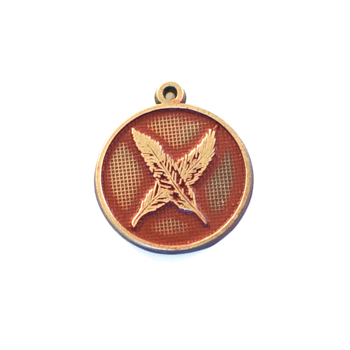 Warrior Token charm with hand-painted design, available as a card, bracelet, or necklace, hypoallergenic and crafted in Denver, CO.