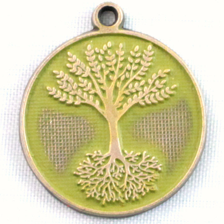 Tree of Life charm, hand-painted, 3/4” long, available as card, bracelet, or necklace, hypoallergenic, limited edition.