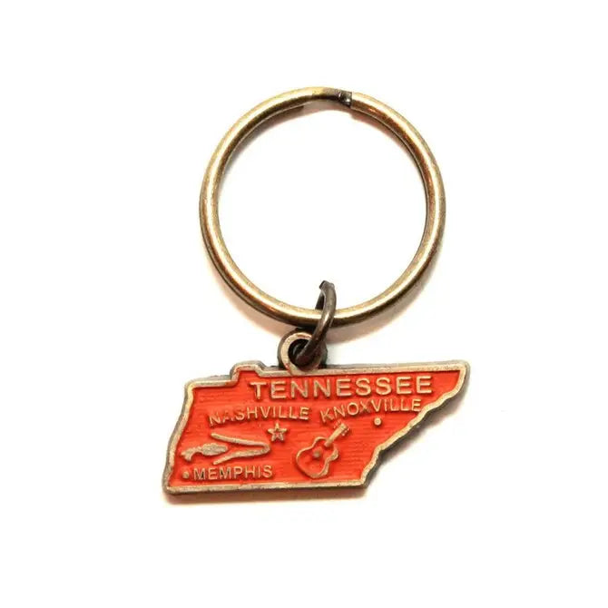 Tennessee state map keychain with guitar illustration, hand-painted, hypoallergenic, 1 3/8” charm on 1” bronze keychain.