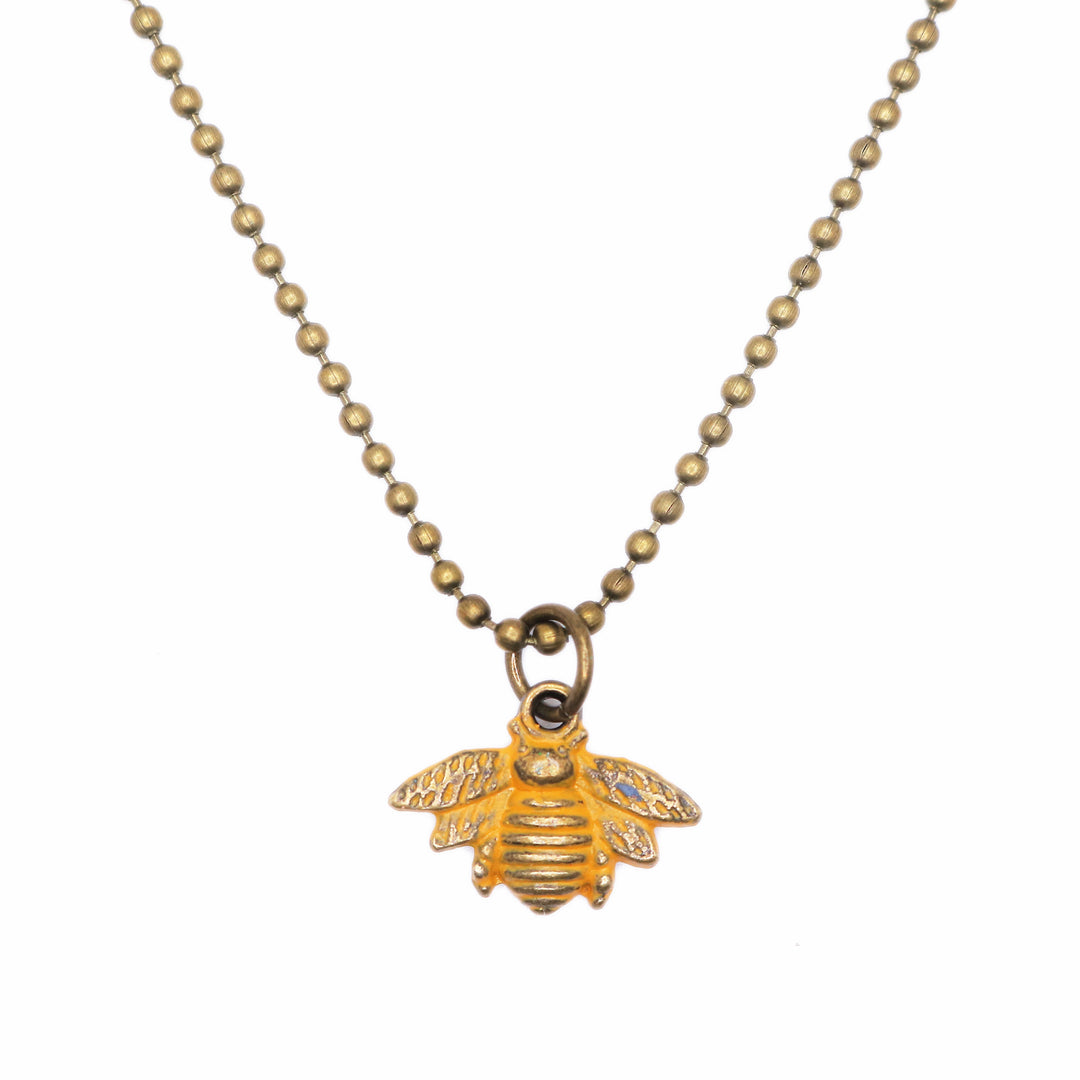 Antique bronze bee charm hand-painted yellow and burnished.