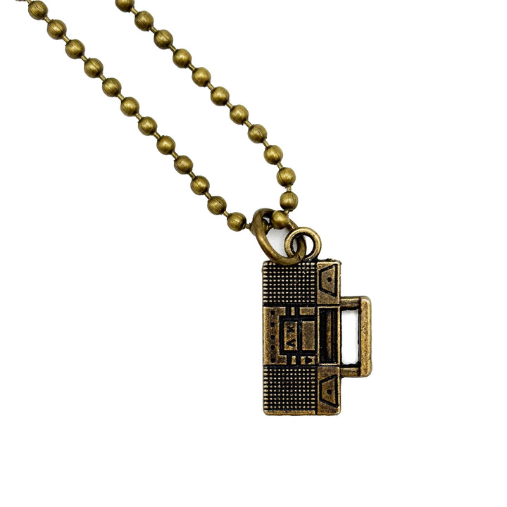 Retro boombox charm painted black and burnished to bright gold. Shown on 18" bronze ball chain.