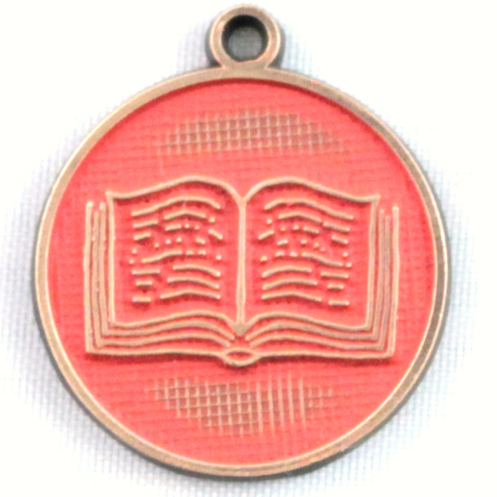 Be a Limited Edition charm with book icon, designed by Nikki Carpenter, 3/4” long, available as charm on card, bracelet, or necklace, hand-painted in Denver, CO, hypoallergenic.