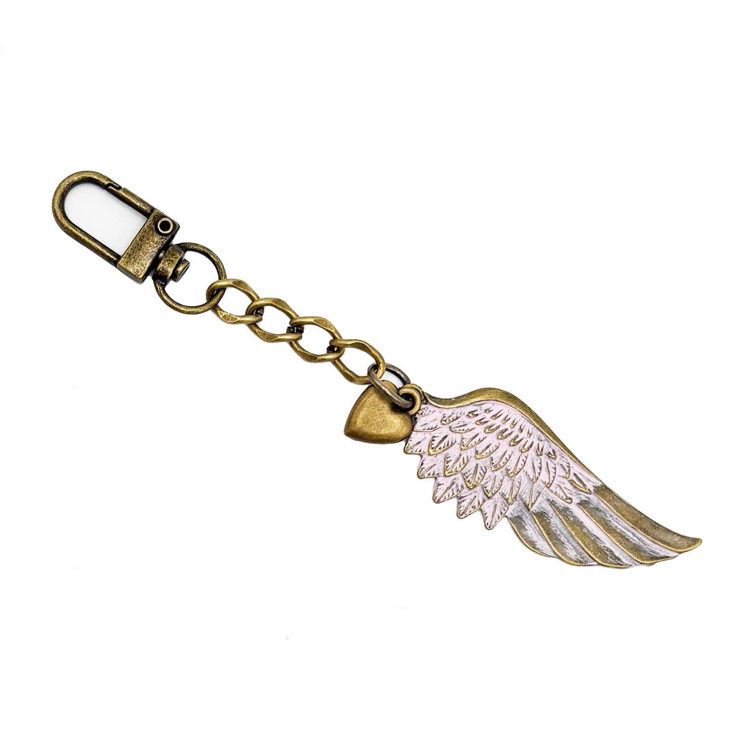 Hand-painted bag charm with angel wing, heart charm, and lobster claw, 5 inches long, hypoallergenic, made in Denver, CO.