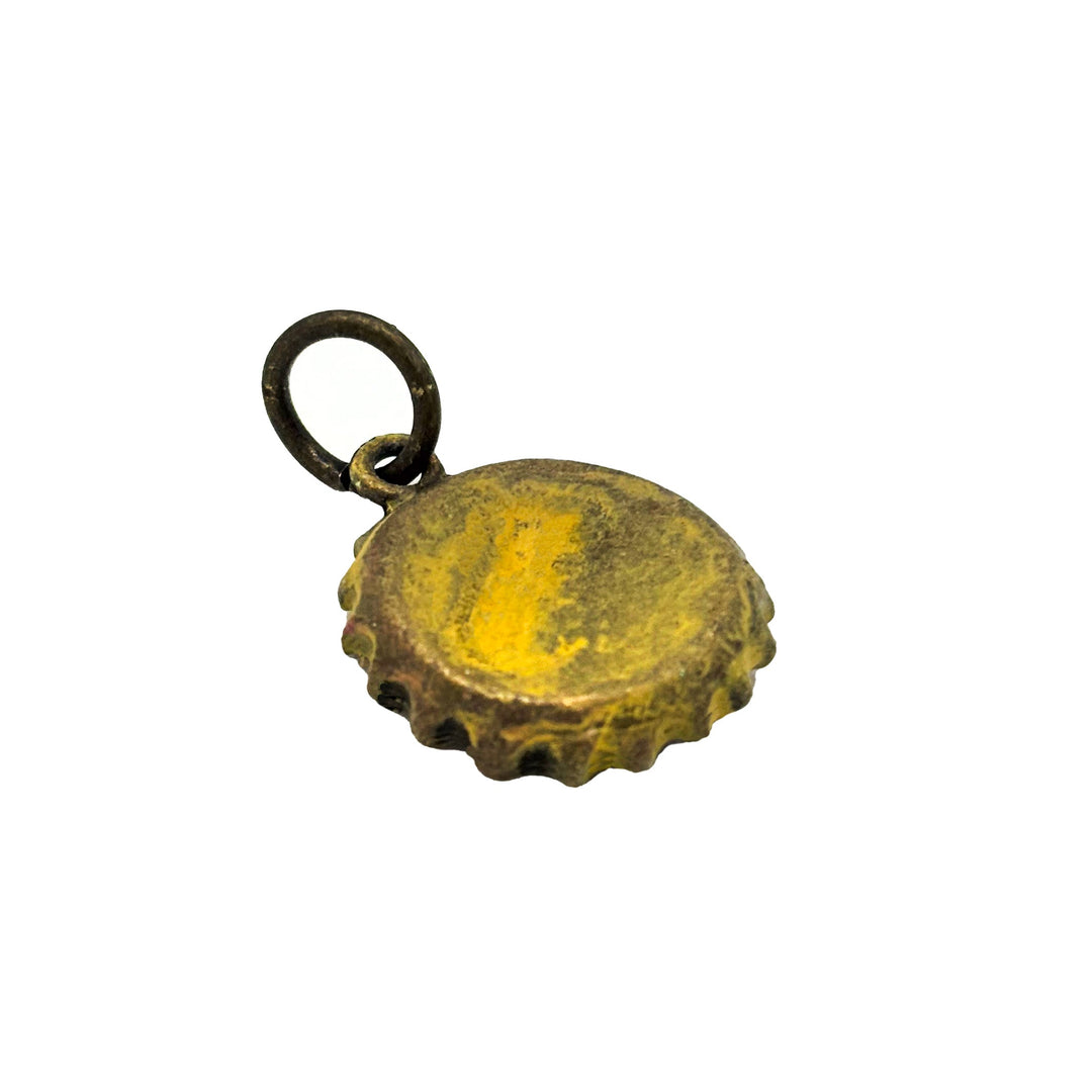 Antique bronze bottle cap charm is painted dark gray and burnished until shiny. Charm comes with jump ring. Vintage style.
