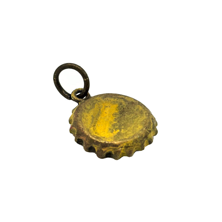 Antique bronze bottle cap charm is painted dark gray and burnished until shiny. Charm comes with jump ring. Vintage style.