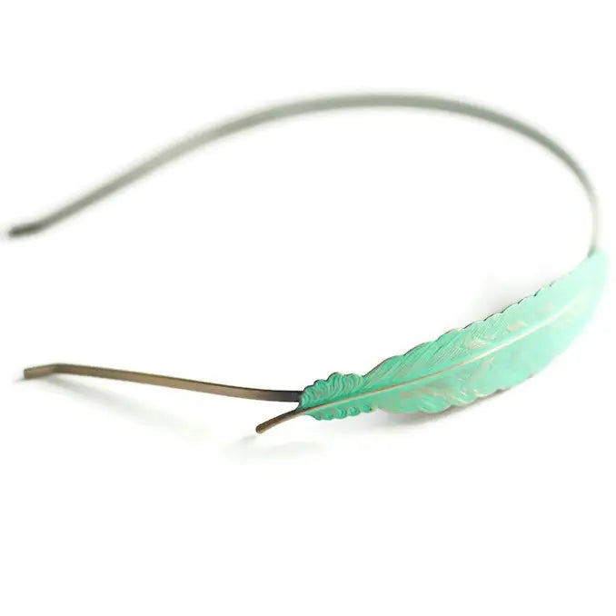 Feather Quill Cuff Headband with hand-painted feather design, flexible fit, hypoallergenic, lead-free, and nickel-free.