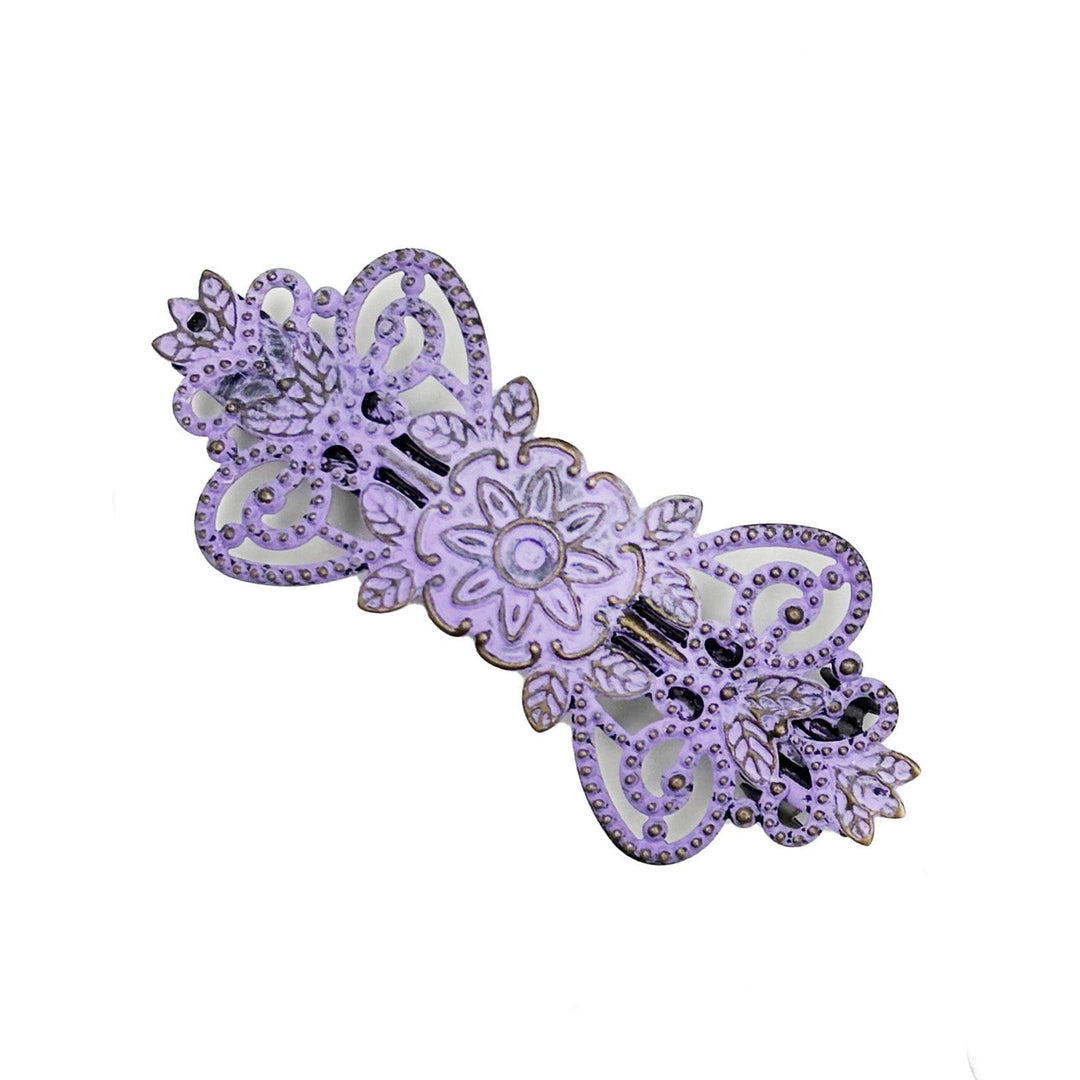 Antique bronze filigree barrette with a flower, vines and leaves. Hand-painted lavender purple and burnished to shiny gold.