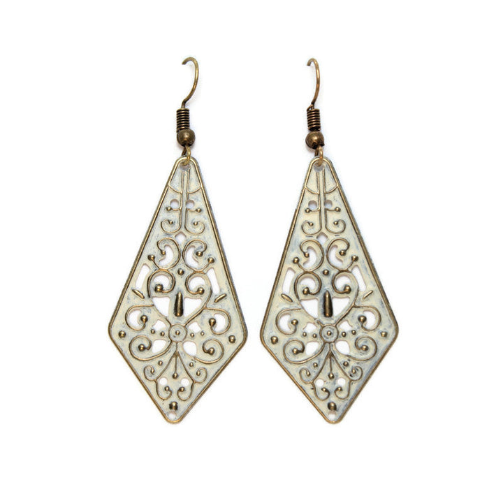 Pendulum-shaped lightweight charms adorned with vintage flourishes. Hand-painted cream and burnished to shiny gold. On 1" ear wires.