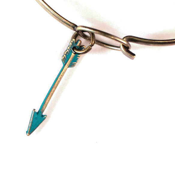 Antique bronze arrow charm painted aqua blue and burnished to shiny gold. Charms come with attached jump ring.