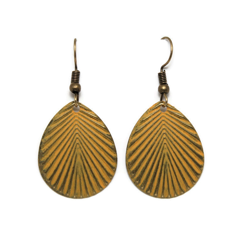 Antique bronze tear-drop lightweight charms on 1" ear wires. Hand-painted mustard yellow with a disco-inspired 70s graphic detail.