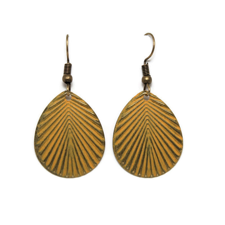 Antique bronze tear-drop lightweight charms on 1" ear wires. Hand-painted mustard yellow with a disco-inspired 70s graphic detail.