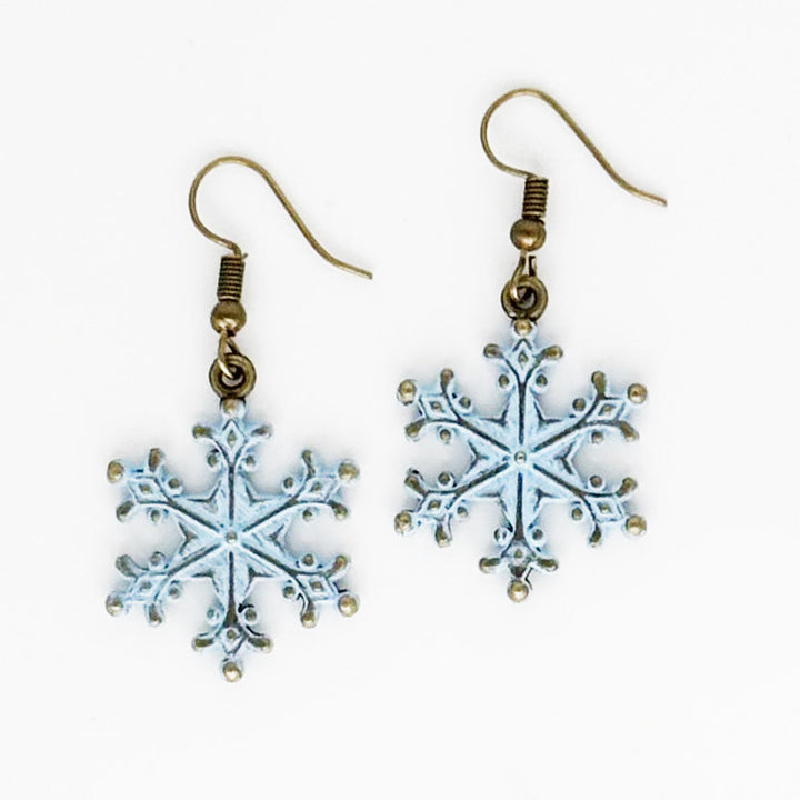Hand-painted snowflake earrings, perfect winter and Christmas gift, artisan-made in Denver, hypoallergenic, 3/4” charms on 1” ear wires.