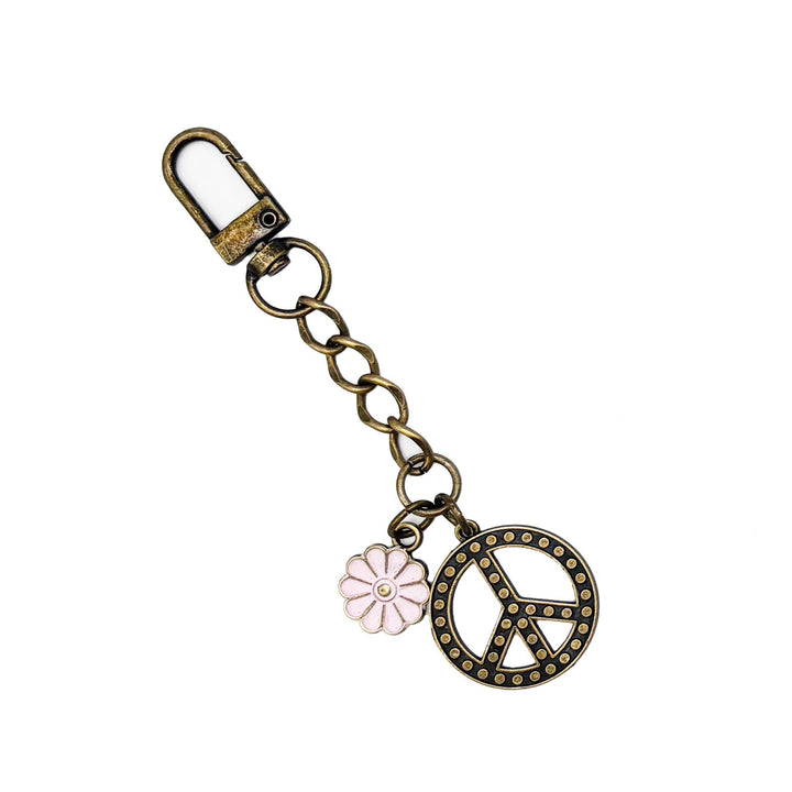 Hand-painted bag charm with peace sign and daisy, 4.5 inches, hypoallergenic, doubles as keychain.