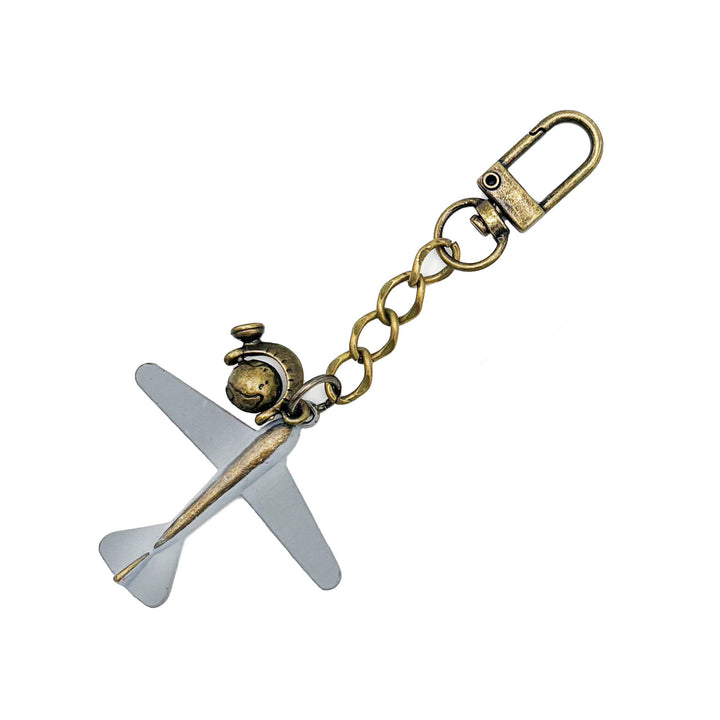 Large antique bronze airplane charm painted light gray with an antique gold rotating globe charm. On a short chain with modern clasp to wear on your purse/handbag. Total length of this bag charm is 4 1/2".