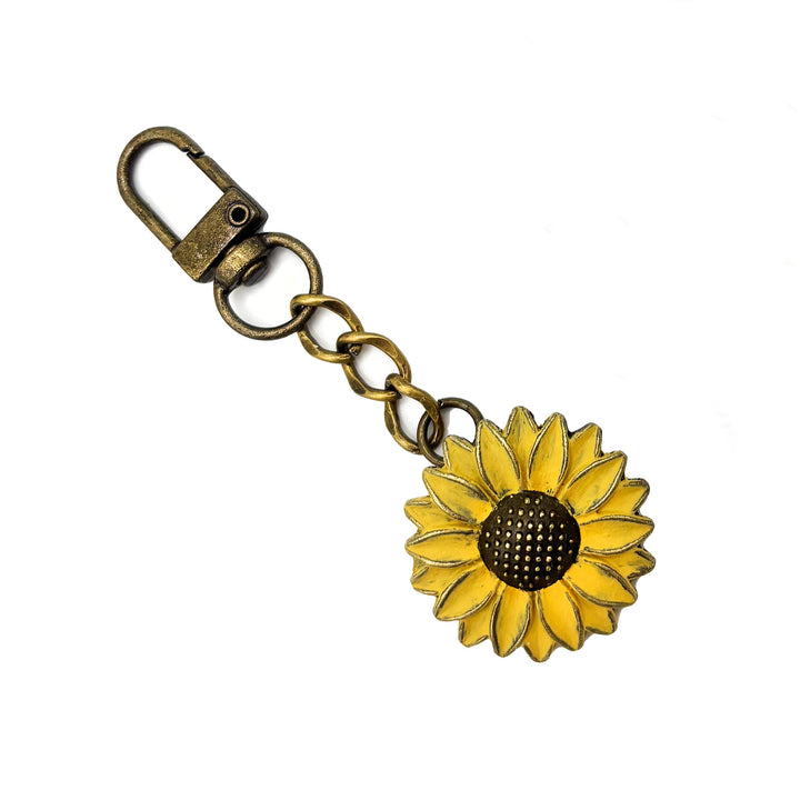 Sunflower charm with lobster-claw clasp, hand-painted by artisans, 4.5" length, hypoallergenic, lead-free, nickel-free.