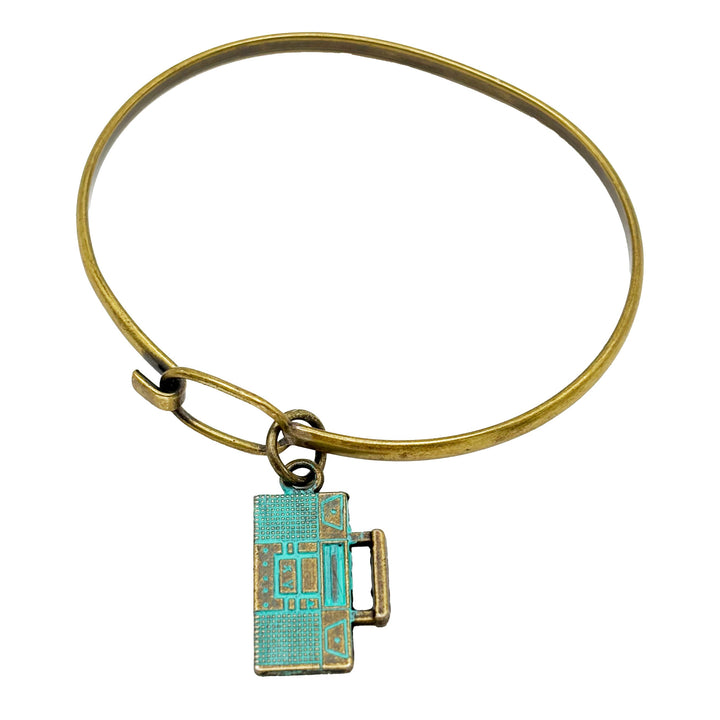 Retro boombox charm painted turquoise and burnished to bright gold. Shown on brass hook bracelet.