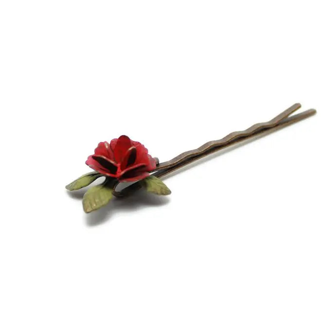 Dainty rose bobby pin with hand-painted charm, 1” on 2 1/4” pin, hypoallergenic, lead-free, nickel-free, crafted in Denver, CO.