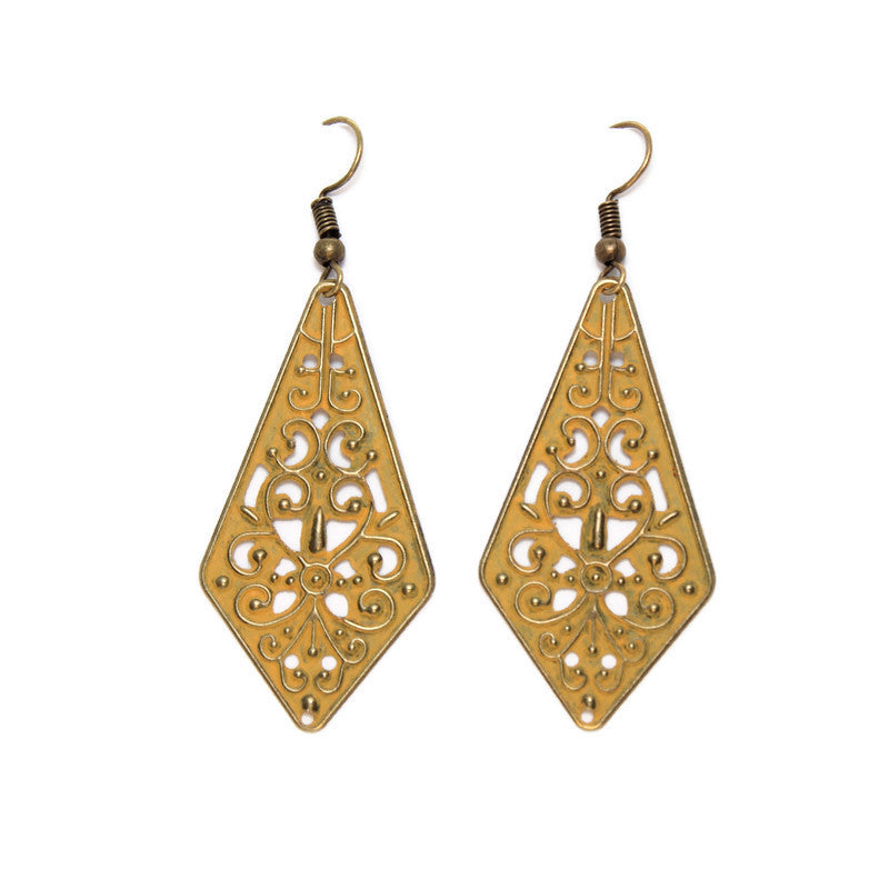 Pendulum-shaped lightweight charms adorned with vintage flourishes. Hand-painted mustard yellow and burnished to shiny gold. On 1" ear wires.
