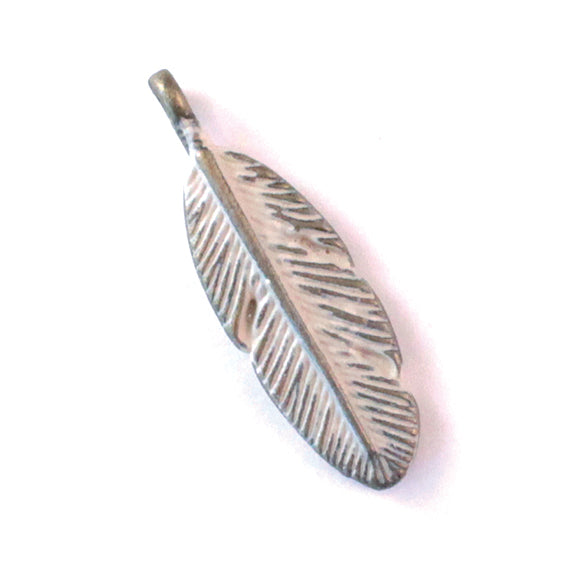 Hand-painted Feather Charm with bohemian vibes, available as a charm on card, bracelet, or necklace. Hypoallergenic and crafted in Denver, CO.