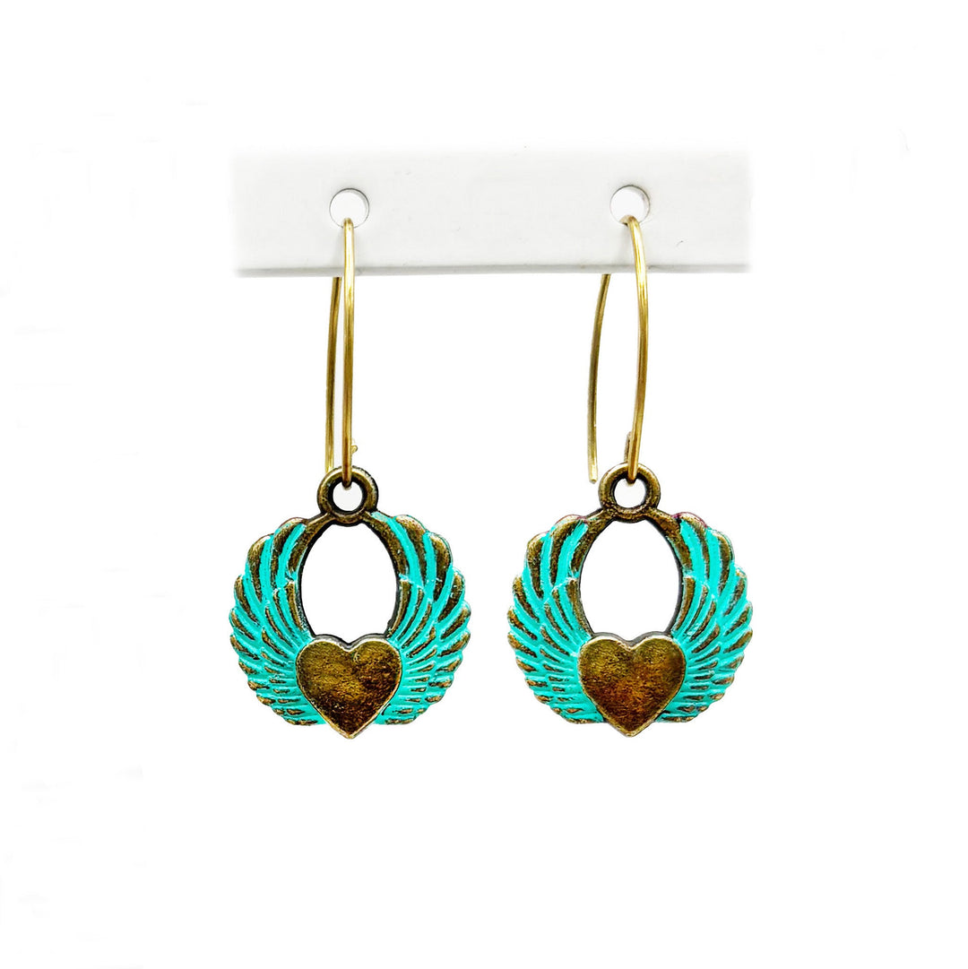 Winged heart earrings with hand-painted charms on gold-toned dangle wires, hypoallergenic, 3/4" charms, 1" wires.