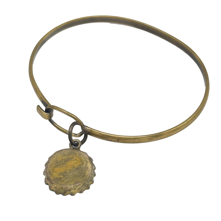 Antique bronze bottle cap charm is painted light mint and burnished until shiny. Charm comes with jump ring. Vintage style.