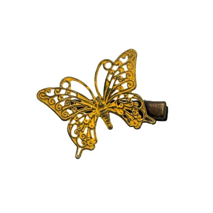Butterfly hairclip, hand-painted, colorful, lightweight, 1.5” x 1.25”, hypoallergenic, artisan-made in Denver, CO.