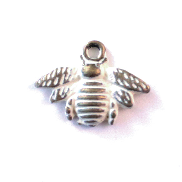 Antique bronze bee charm hand-painted cream and burnished.
