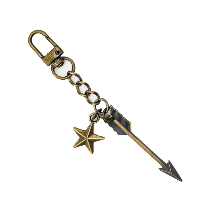 Arrow with bronze star bag charm, hand-painted by artisans, 4.5 inches long, hypoallergenic.