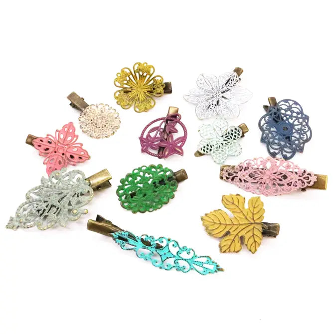 Hand-painted hair clips with filigree charms, lightweight and hypoallergenic, crafted by artisans in Denver, CO.