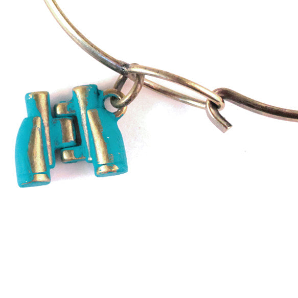 Antique bronze folding binoculars charm painted turquoise and burnished to shiny gold. Charms come with attached jump ring.