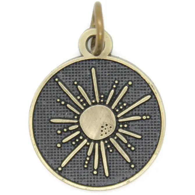 Limited-edition token charm with a beaming sun illustration, hand-painted by artisans in Denver, CO. Available as a charm on card, bracelet, or necklace. Hypoallergenic and lead-free.