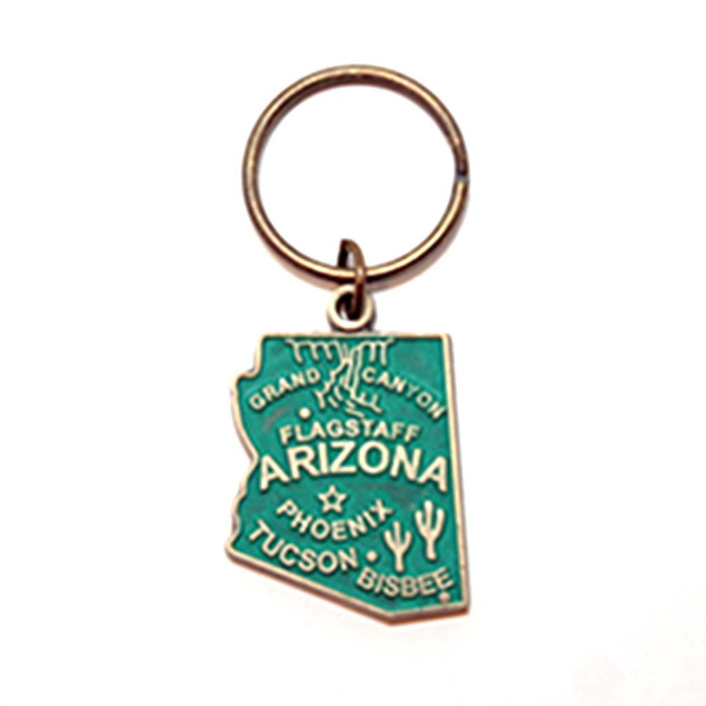 Antique bronze 1 5/8" charm keychain on 1 1/4" keyring. Alaska state charm painted teal and burnished to shiny gold. Map depicts location of Flagstaff, Phoenix, Tucson and Bisbee. Illustrated with the Grand Canyon and Saguaro cacti.