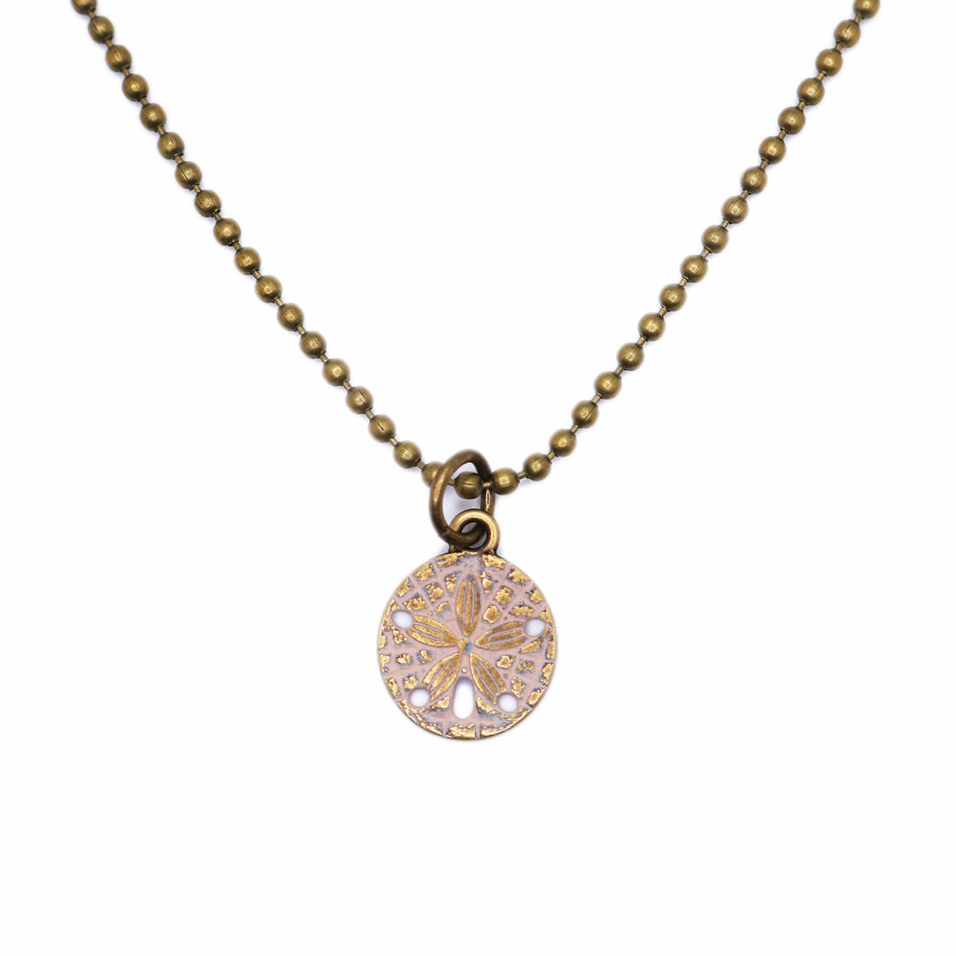 Sand Dollar Charm, 5/8” long, available as Charm on Card, 7 1/2” brass hook bangle bracelet, or 18” antique bronze ball chain necklace, hand-painted in Denver, CO, hypoallergenic.