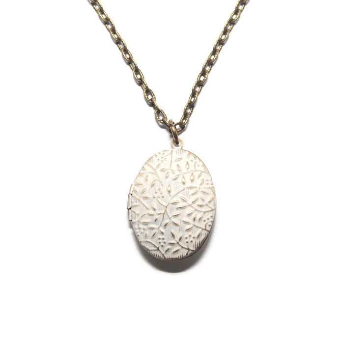 White Locket with leaves vintage looking